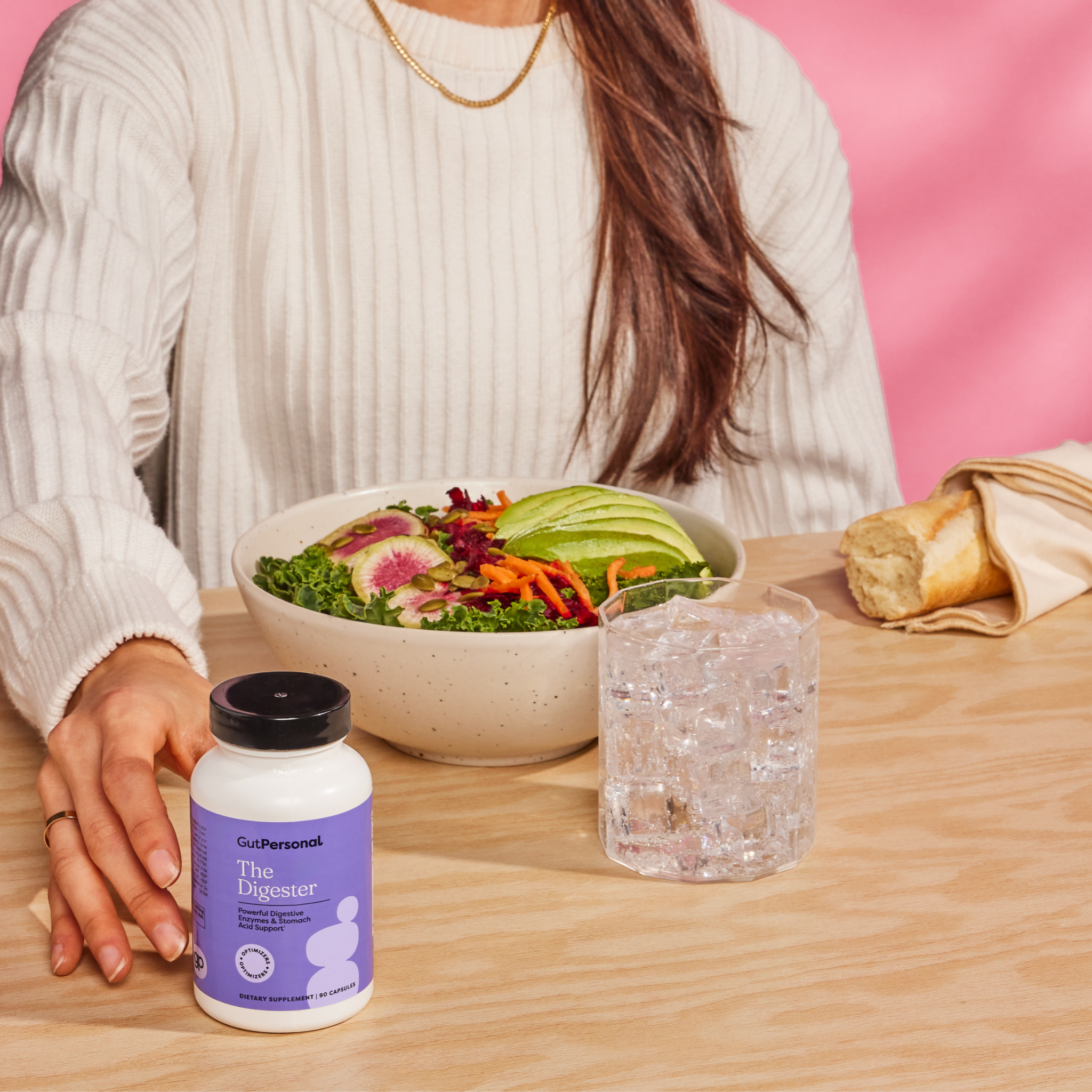 image of a woman with a vegetables and the digester supplement by gutpersonal