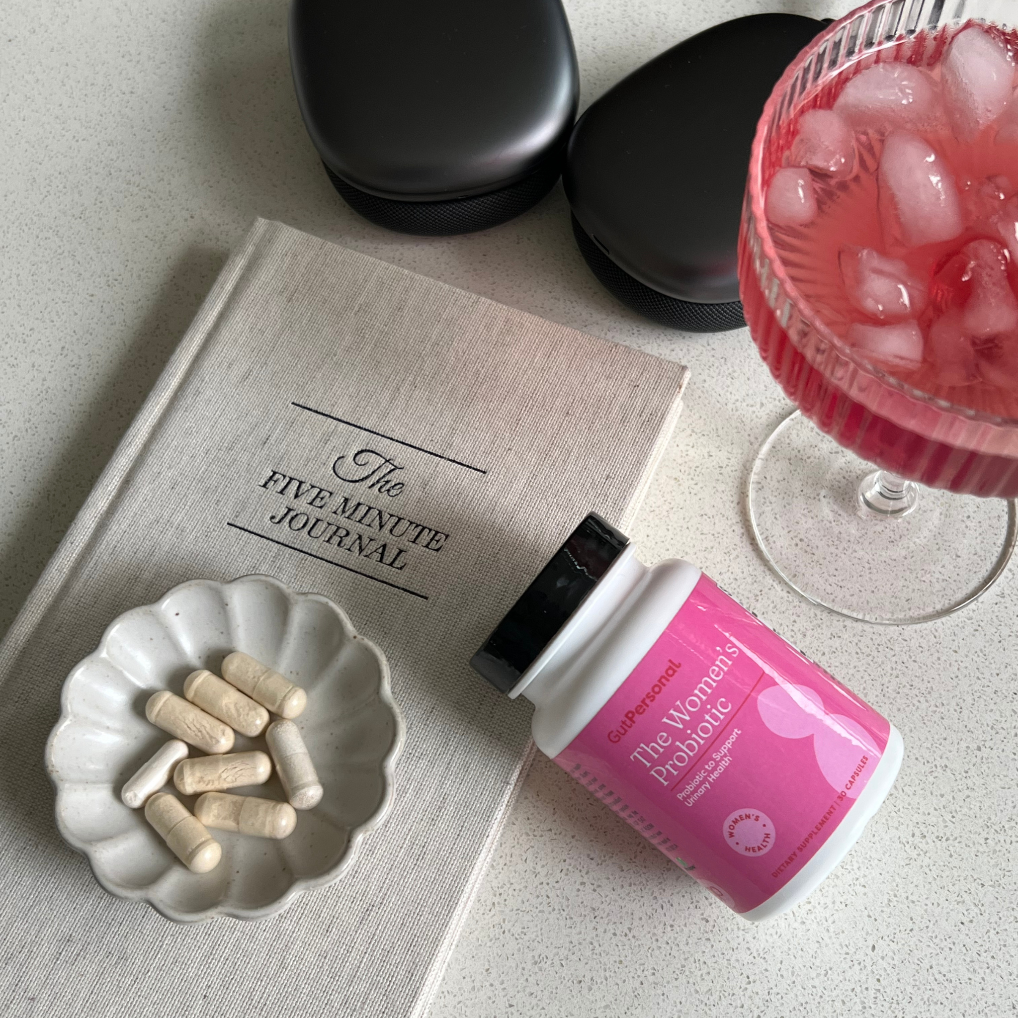 probiotic on a journal with a mocktail